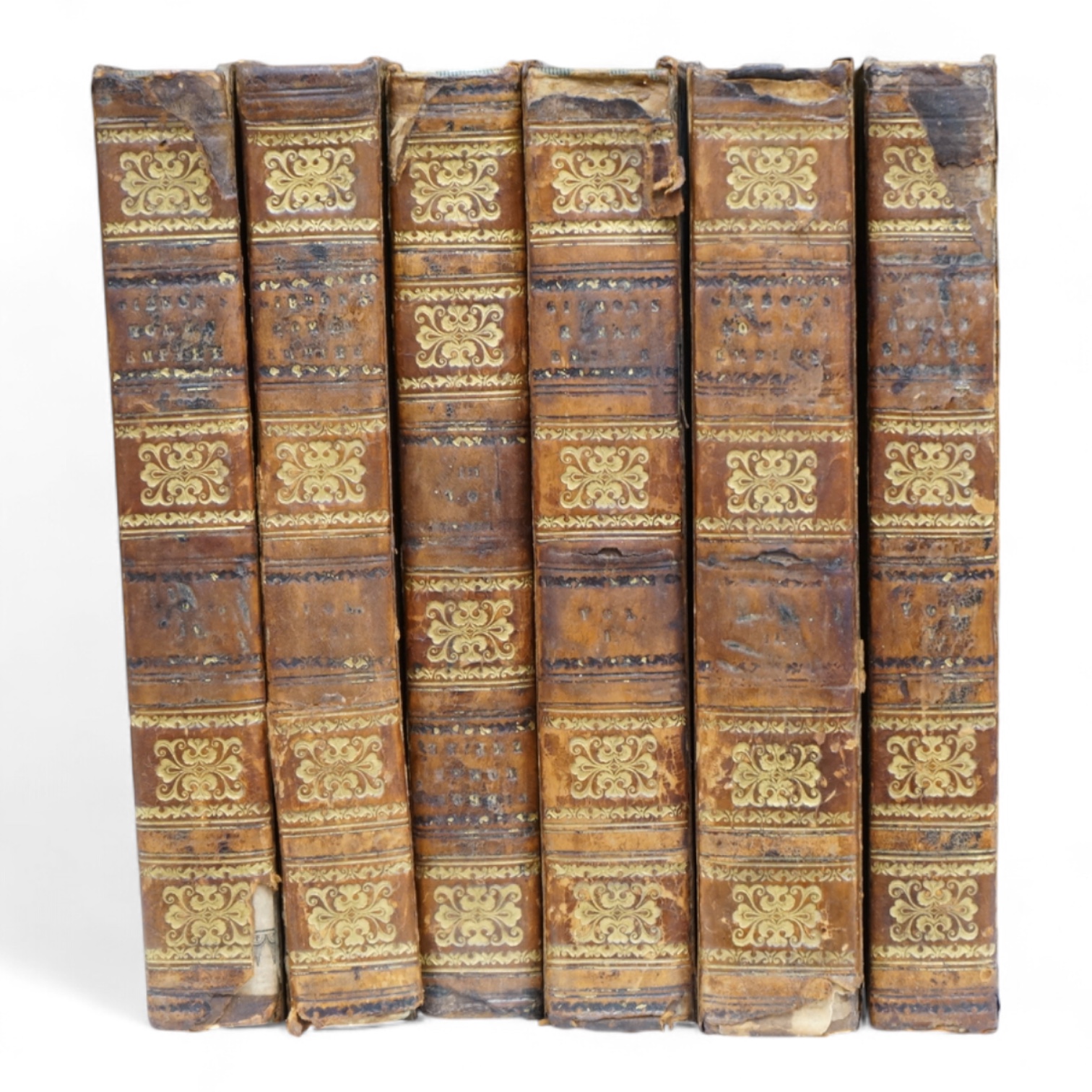 Gibbon, Edward - The History of the Decline and Fall of the Roman Empire. new edition, 6 vols. (title page for first vol. not present). 2 folded maps; contemp. gilt decorated tree calf, marbled edges, 1783.